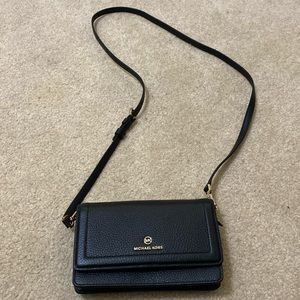 Michael Kors small black bag with long strap. New without tags.